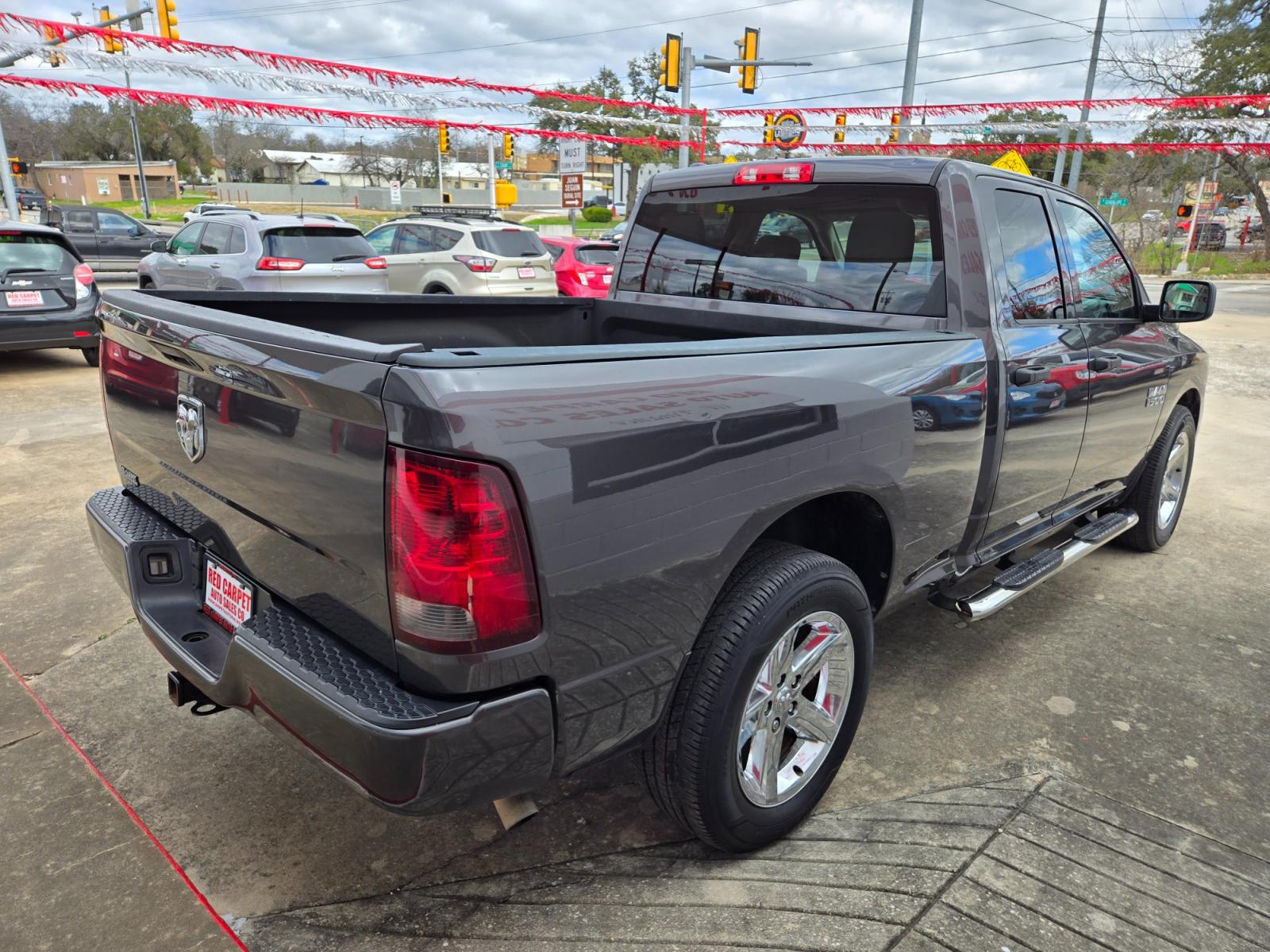 2018 GRAY RAM 1500 (1C6RR6FG9JS) with an 3.6L V6 F DOHC 24V engine, Automatic transmission, located at 503 West Court, Seguin, TX, 78155, (830) 379-3373, 29.568621, -97.969803 - 2018 RAM 1500 Tradesman Quad Cab 2WD with a 3.6L V6 F DOHC 24V, Automatic, Tilt, Cruise, AM/FM Touchscreen Stereo, Power Windows, Locks and Side Mirrors, Bluetooth, Front Bench Seating, Tinted Windows, Alloy Wheels, Towing, Running Boards, Backup Camera and more!! - Photo #2